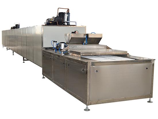 Chocolate depositing machine